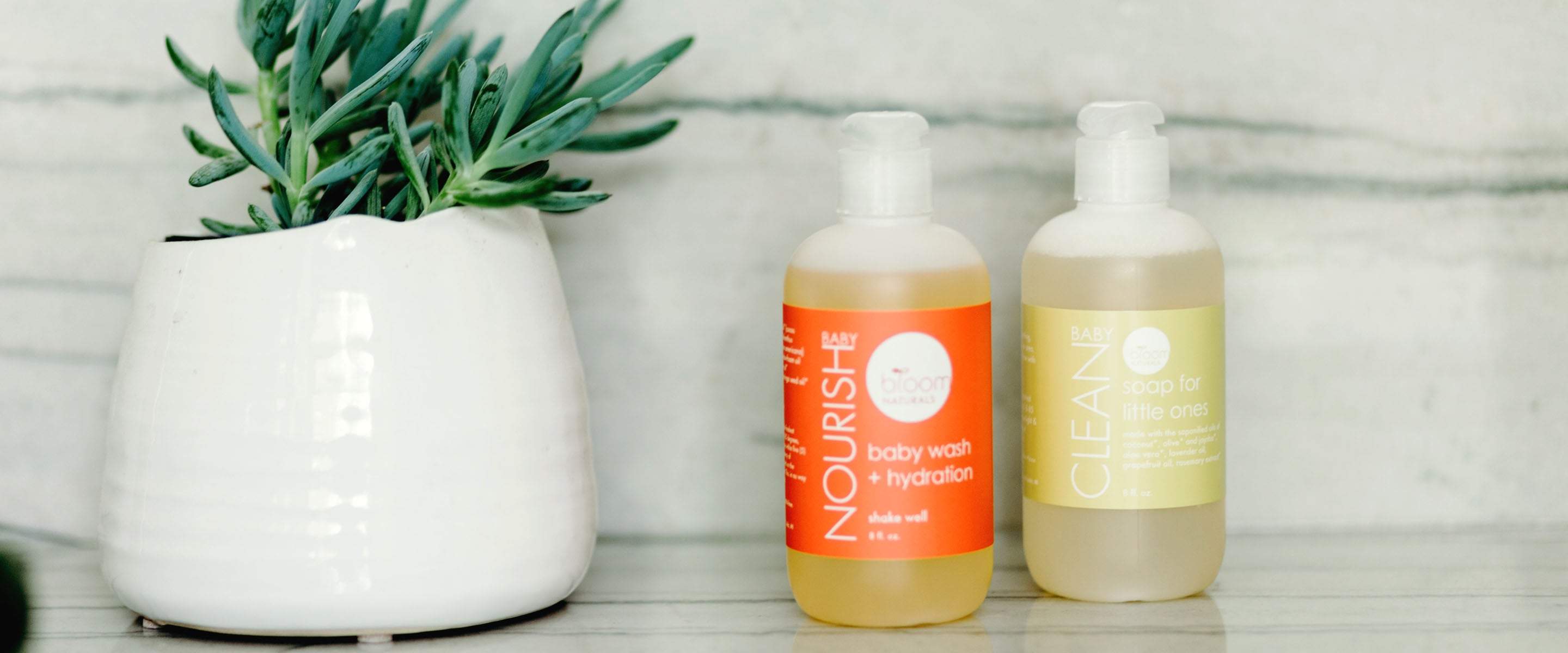 Nourish and Cleanbaby sitting on bathroom sink will keep your littleones skin healthy for the rest of their life.