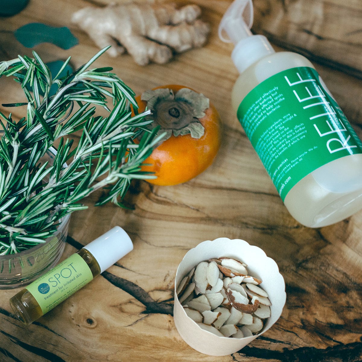 Bloom Naturals The Cure-E system featuring RELIEF cleanser and SPOT treatment with fresh rosemary and almonds
