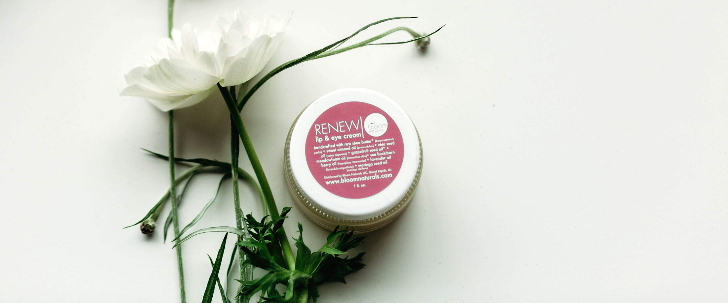 Our product Renew that is sitting on this white table remedies issues with the delicate skin under your eyes.