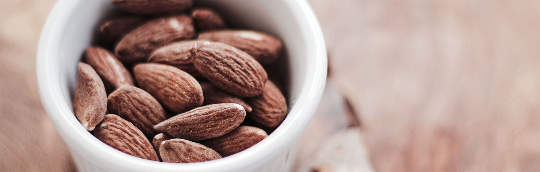 The almonds you see in this cup help to remedy eczema concerns on your skin with the Cure E system.