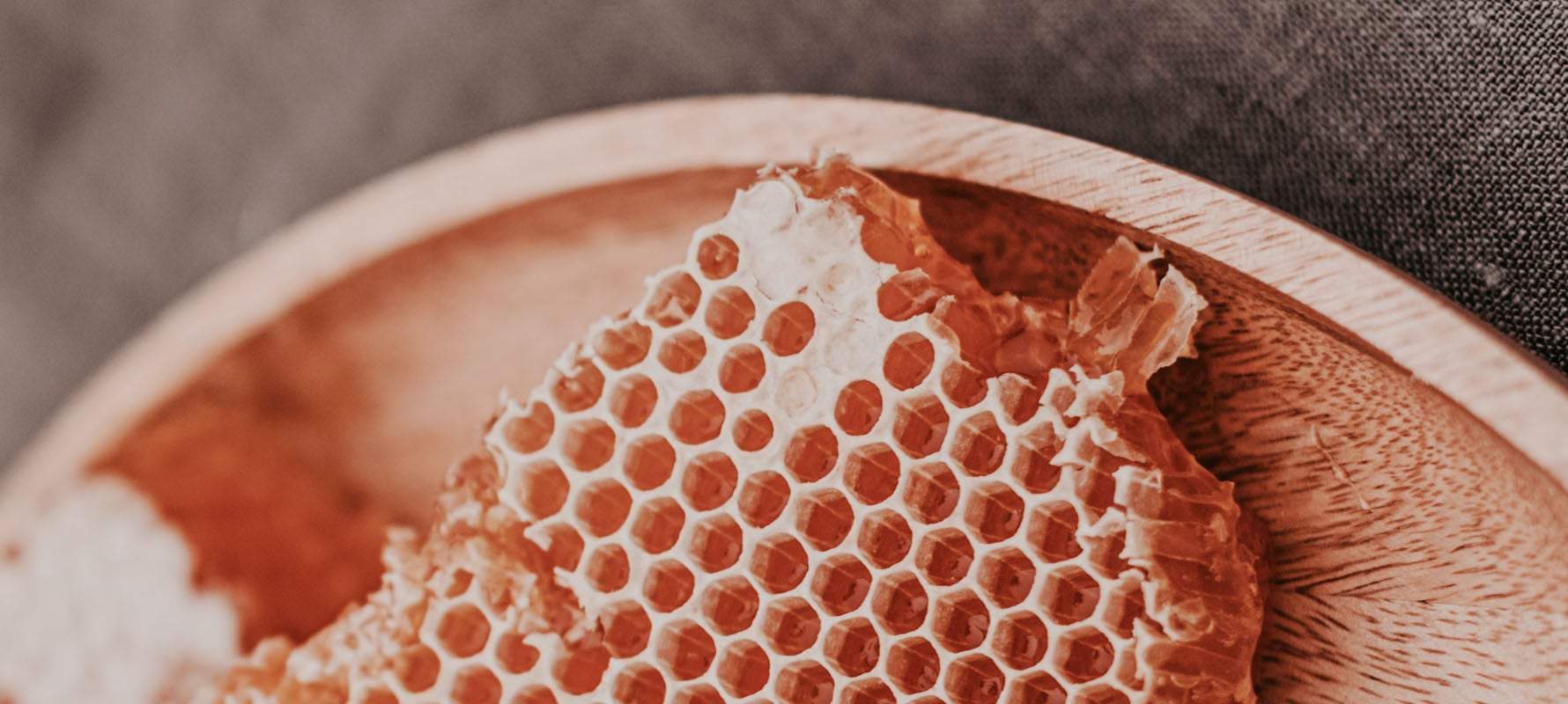 The honey from the honeycomb on the table is one ingredients that will make all the difference in your skin for severe eczema.